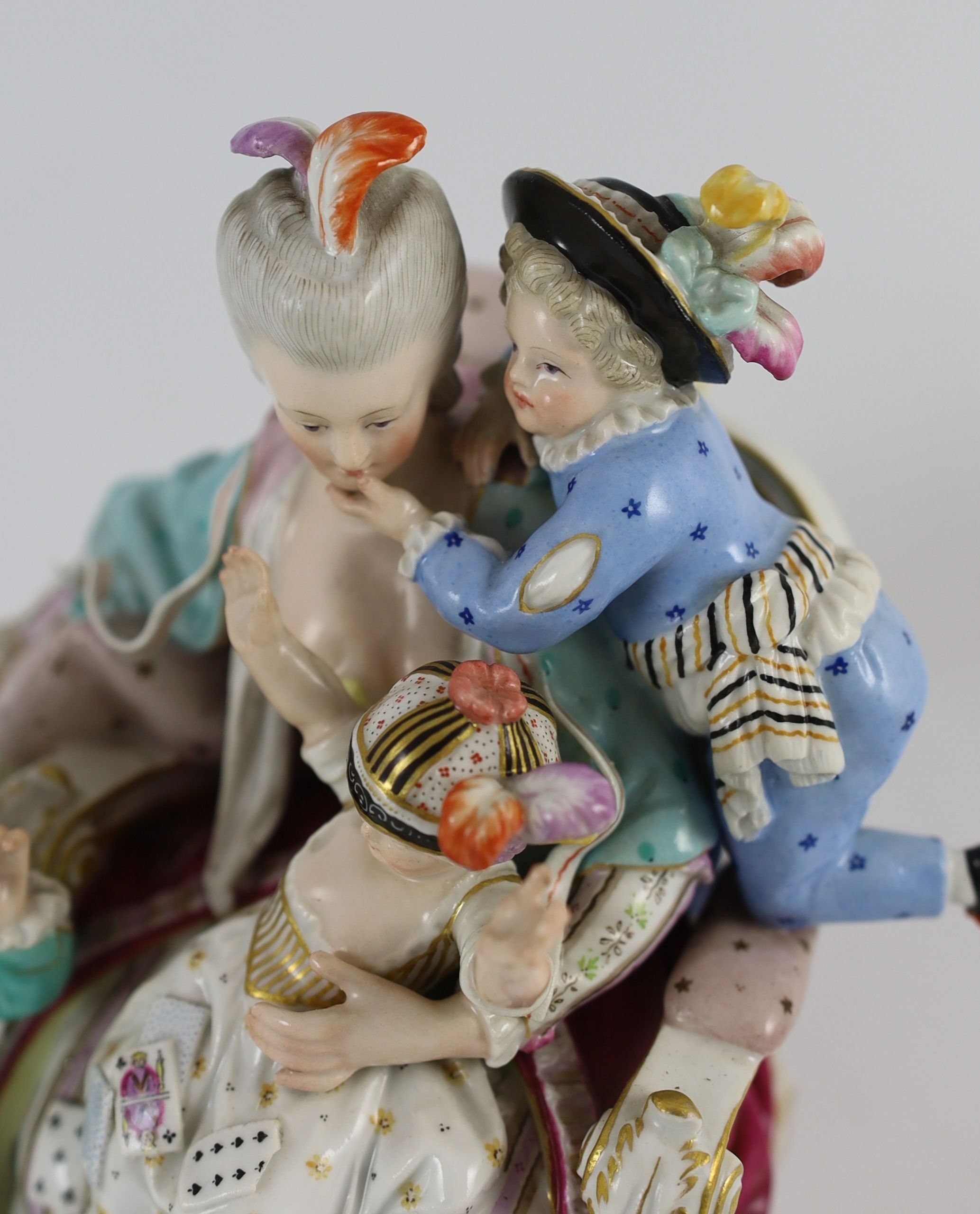 A Meissen group of the good mother, 19th century, after a model by Michel Victor Acier, 22 cm high